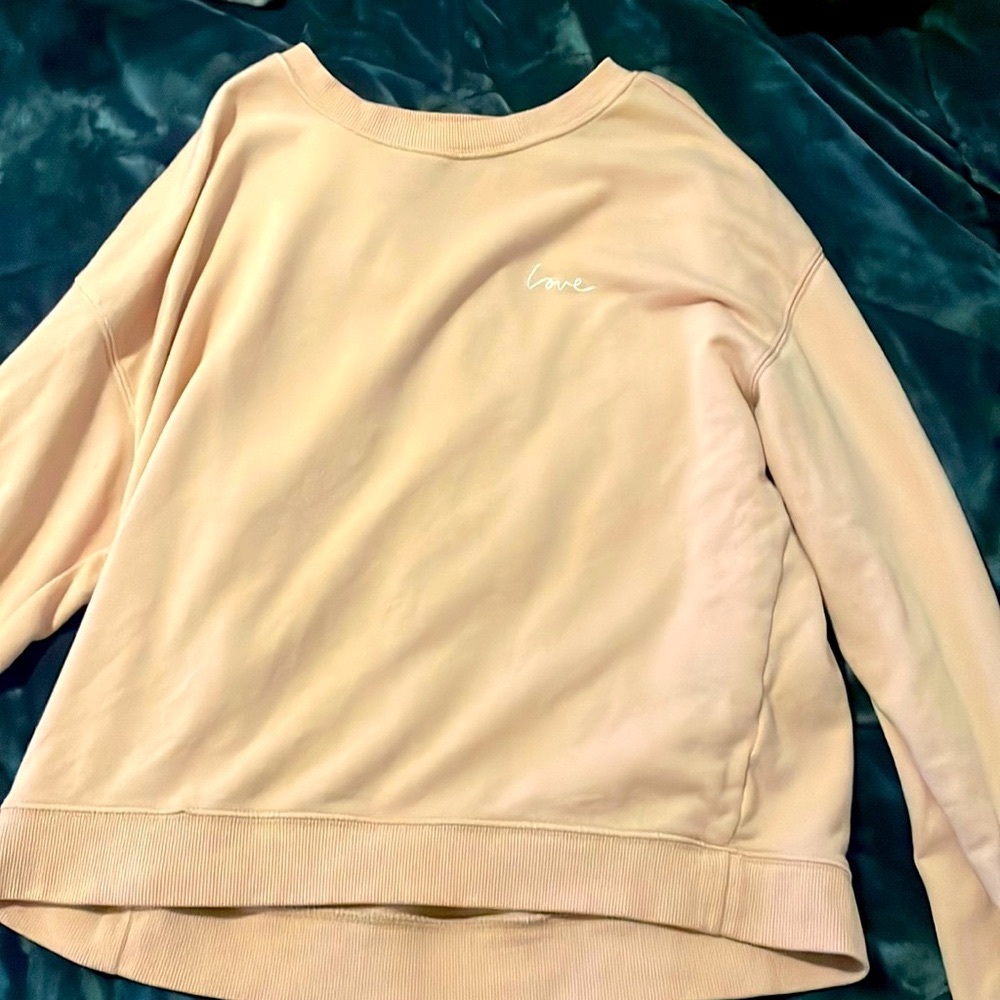 Light pink love long sleeve crew neck.